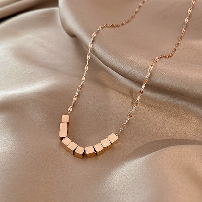 Copper Inlaid Zircon Pendant Necklace with Stainless Steel Chain