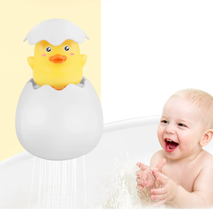 Cute duck and penguin bath toys with water spraying action for kids aged 0-6.