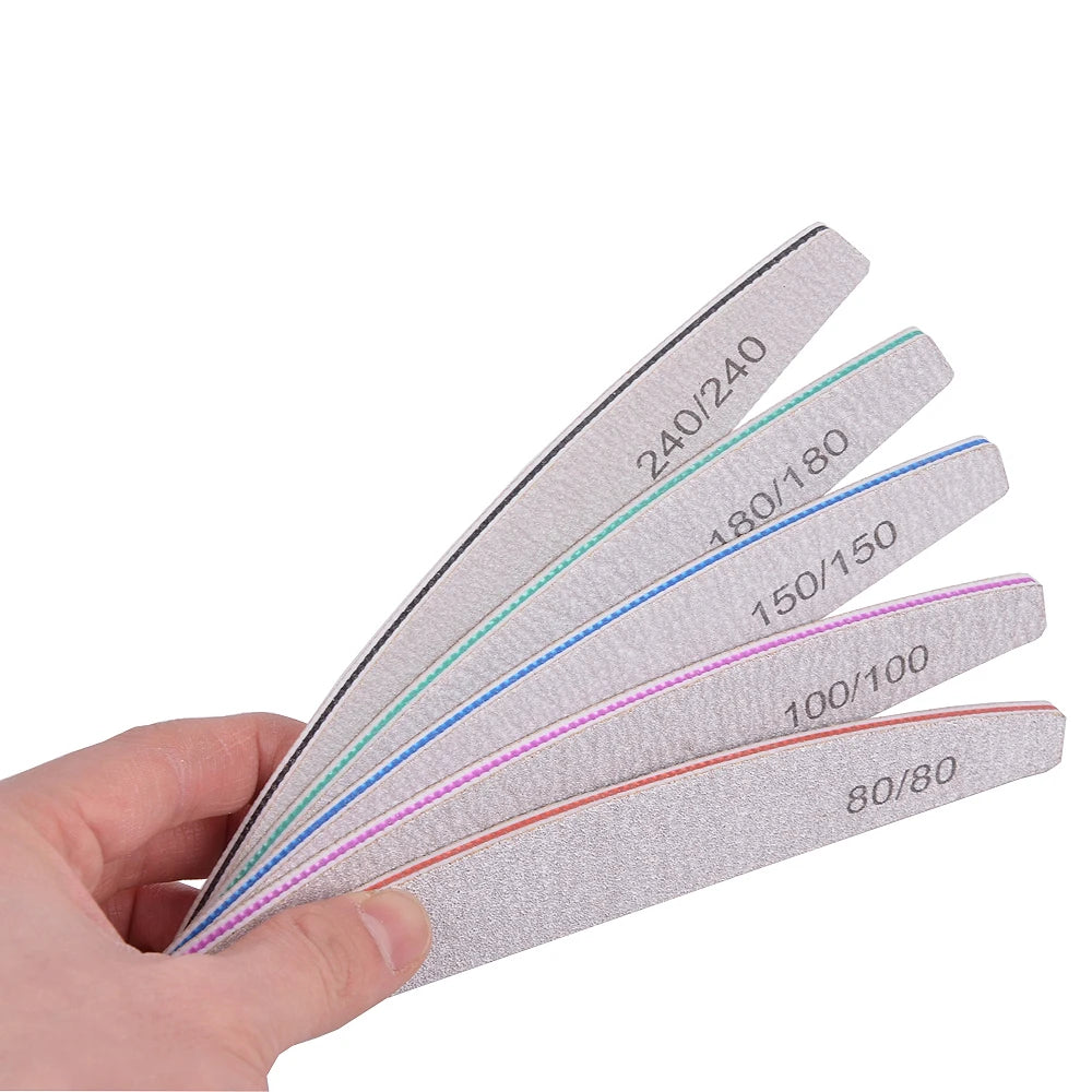 Set of 5 or 10 half-moon shaped professional nail files with 100/180 grit, perfect for shaping and smoothing nails.