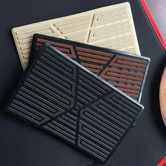 Universal PVC car floor mat with anti-skid design, 23x15cm, in black, beige, and brown.