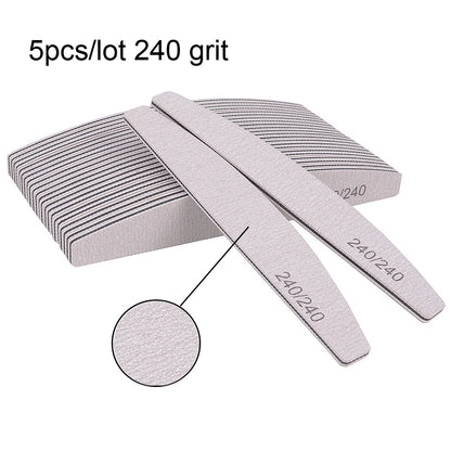 Set of 5 or 10 half-moon shaped professional nail files with 100/180 grit, perfect for shaping and smoothing nails.