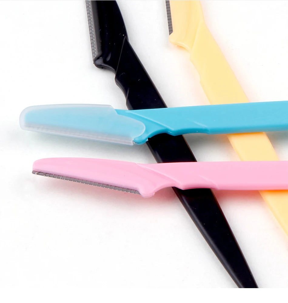 Eyebrow trimmer set in pink, yellow, blue, and black, featuring stainless steel blades and ergonomic handles. Includes 3, 4, or 10 pieces for portable grooming.