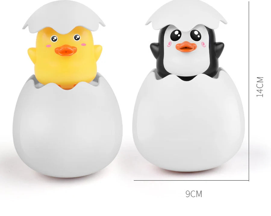 Cute duck and penguin bath toys with water spraying action for kids aged 0-6.