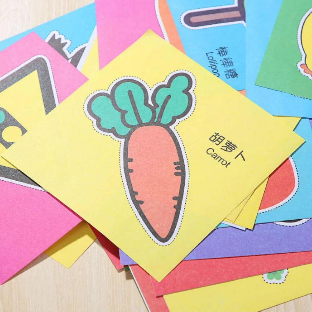 Colorful paper cut-outs and scissors from a DIY craft kit for children, featuring various cartoon-themed designs.