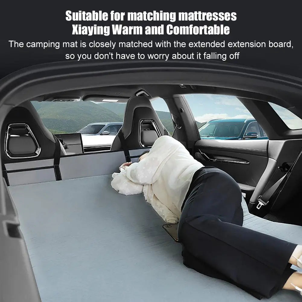 Foldable non-inflatable car mattress for SUVs and trucks with storage bag and side mesh.