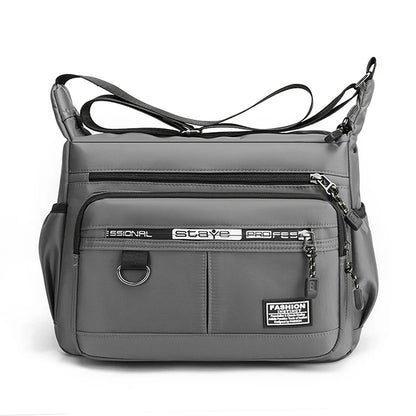 Men's waterproof Oxford messenger bag with a small sling design, featuring multiple compartments and an adjustable crossbody strap for stylish, organized daily use.