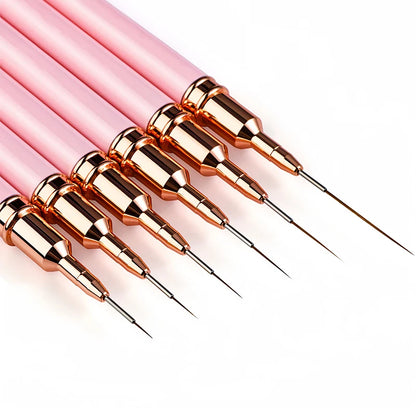 Set of five pink-handled nail art liner brushes of varying sizes displayed in a fan arrangement.