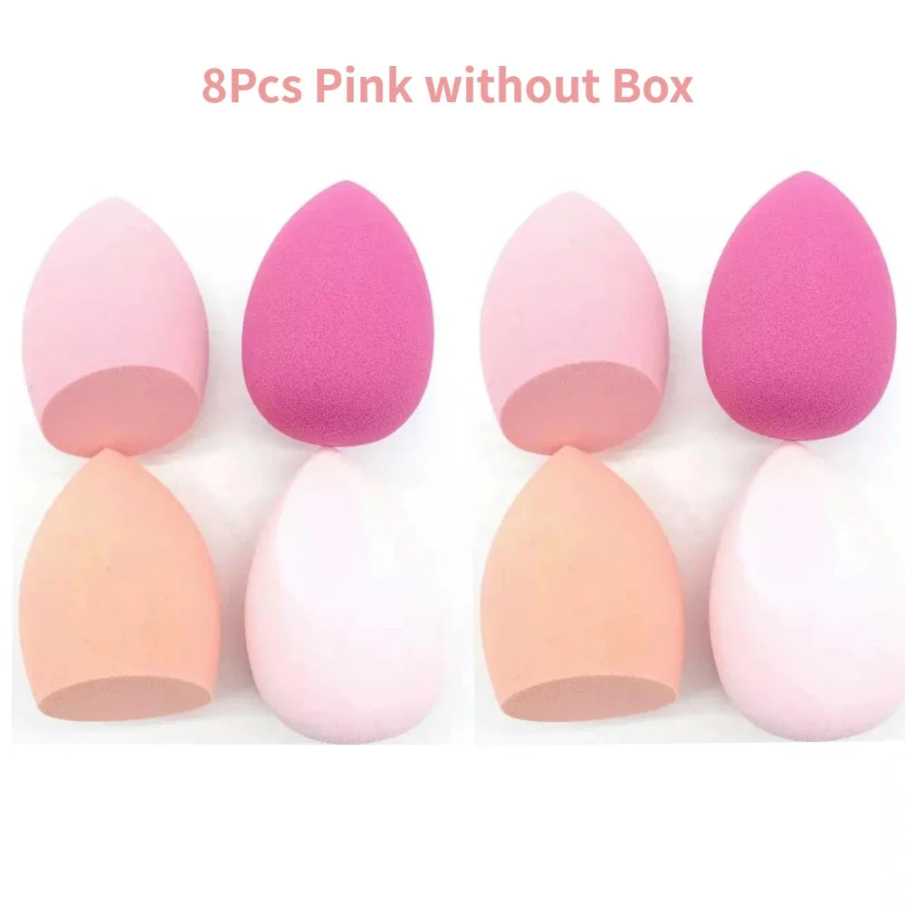 Assorted makeup sponges and puffs in a set of 4/8, ideal for applying foundation, concealer, and blush. Made of soft latex, perfect for a smooth, flawless makeup finish.