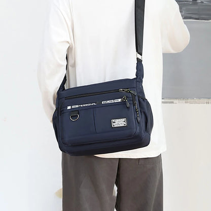 Men's waterproof Oxford messenger bag with a small sling design, featuring multiple compartments and an adjustable crossbody strap for stylish, organized daily use.