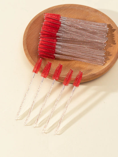 A set of 50 disposable eyelash brushes with soft bristles, perfect for mascara application and lash grooming. Ideal for lash extensions and personal or professional makeup use.