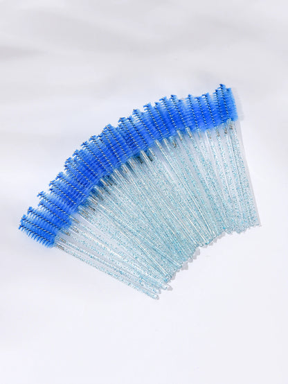 A set of 50 disposable eyelash brushes with soft bristles, perfect for mascara application and lash grooming. Ideal for lash extensions and personal or professional makeup use.