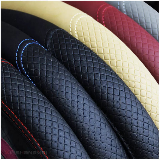 Universal non-slip embossed leather steering wheel cover for all seasons.