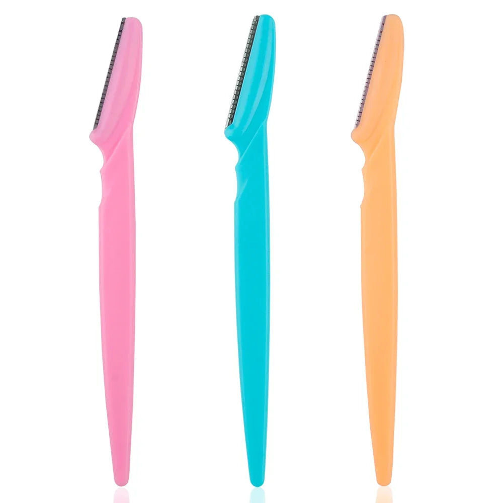 Eyebrow trimmer set in pink, yellow, blue, and black, featuring stainless steel blades and ergonomic handles. Includes 3, 4, or 10 pieces for portable grooming.