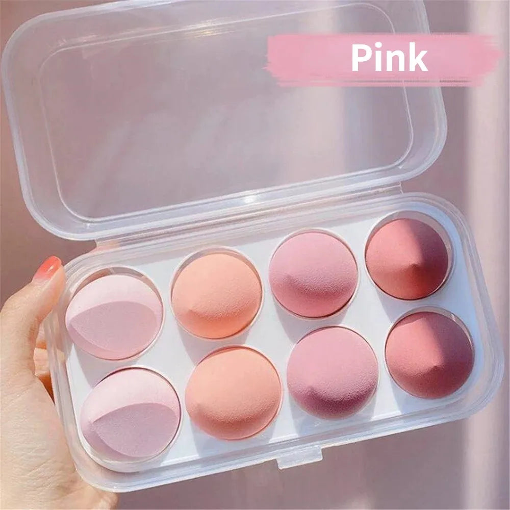 Assorted makeup sponges and puffs in a set of 4/8, ideal for applying foundation, concealer, and blush. Made of soft latex, perfect for a smooth, flawless makeup finish.