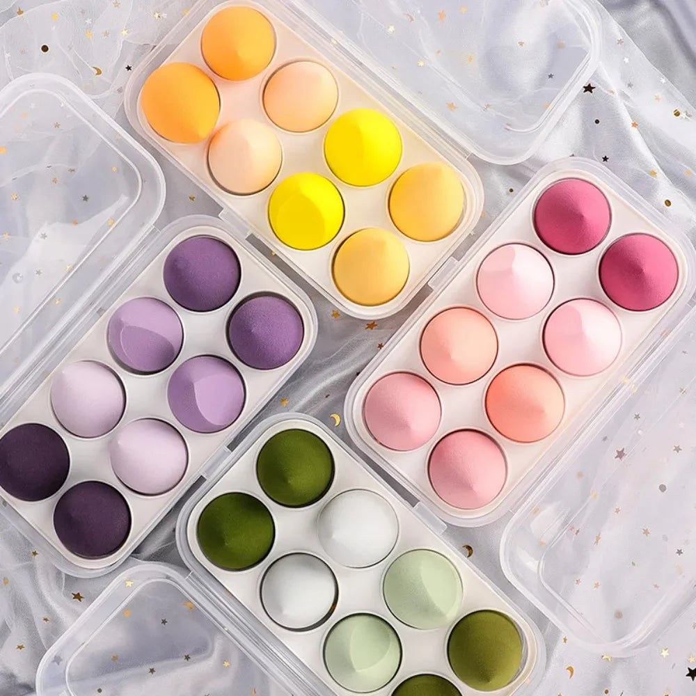 Assorted makeup sponges and puffs in a set of 4/8, ideal for applying foundation, concealer, and blush. Made of soft latex, perfect for a smooth, flawless makeup finish.