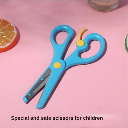 Colorful paper cut-outs and scissors from a DIY craft kit for children, featuring various cartoon-themed designs.