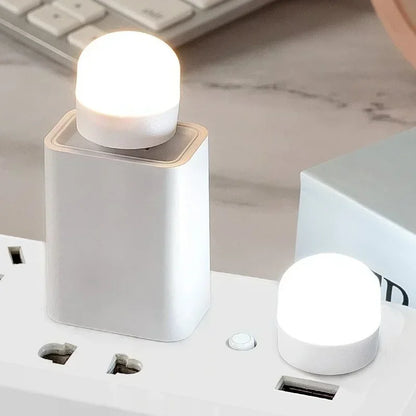 Mini USB Night Light in warm white LED, compact and energy-efficient. Ideal for reading and night lighting. Plugs into any USB port for instant illumination. Available individually or in packs of 50.