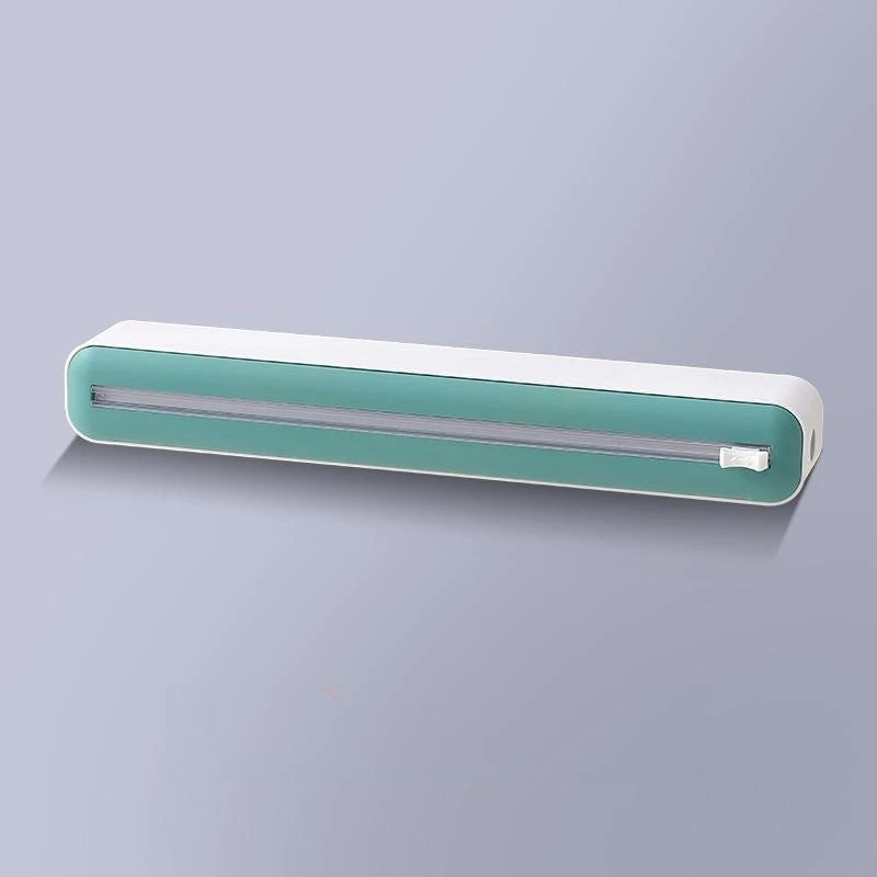 Plastic cling wrap dispenser with cutter, anti-drop design, fits up to 35 cm wide wraps.