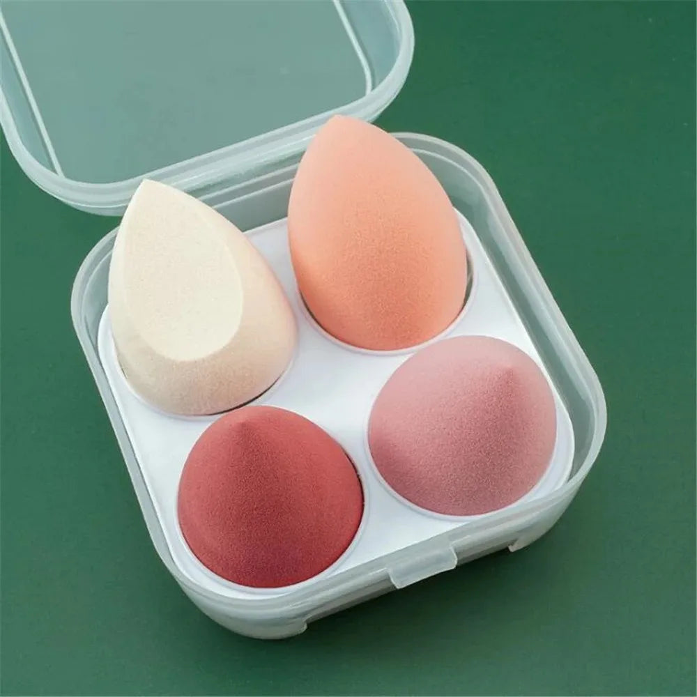 Assorted makeup sponges and puffs in a set of 4/8, ideal for applying foundation, concealer, and blush. Made of soft latex, perfect for a smooth, flawless makeup finish.