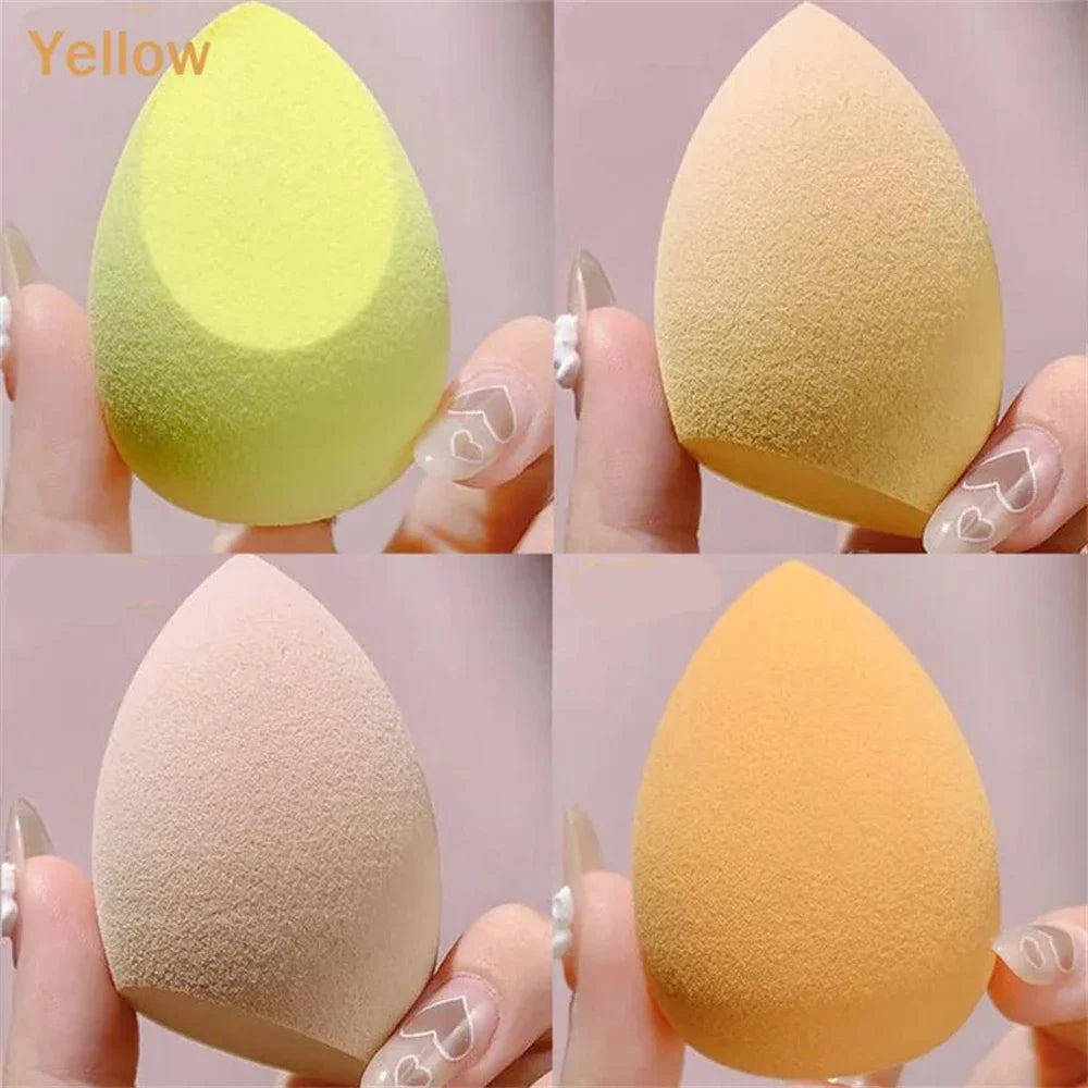 Assorted makeup sponges and puffs in a set of 4/8, ideal for applying foundation, concealer, and blush. Made of soft latex, perfect for a smooth, flawless makeup finish.