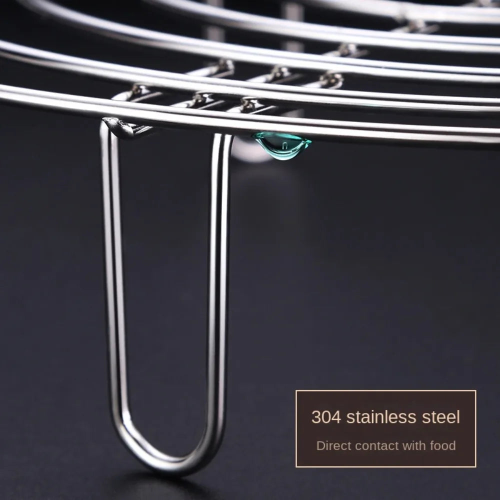 Stainless steel steamer rack in multiple sizes (15.5cm, 19.5cm, 23.5cm, 27.5cm). Made from durable 304 stainless steel, ideal for steaming vegetables and fish, with rust resistance and easy handling.