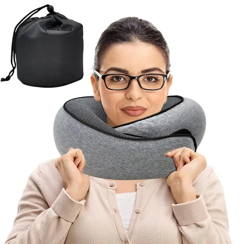 Memory foam neck pillow with pure cotton cover, ergonomic U-shape design, and a waterproof carry bag. Ideal for travel, flights, and camping, providing neck support and comfort.