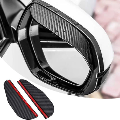 Two carbon fiber-look rain eyebrow visors for car rearview mirrors, providing weather protection and a stylish appearance.