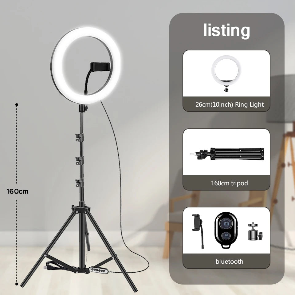 10" LED selfie ring light with adjustable bi-color temperature (3200K-5600K), 3 light modes (white, warm, soft), 10 brightness levels, and a stable tripod with phone stand. Ideal for makeup, live streaming, and photography.