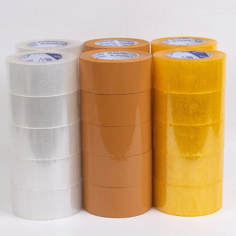 Five rolls of clear packaging tape stacked, showcasing their length and thickness, perfect for secure sealing and shipping.