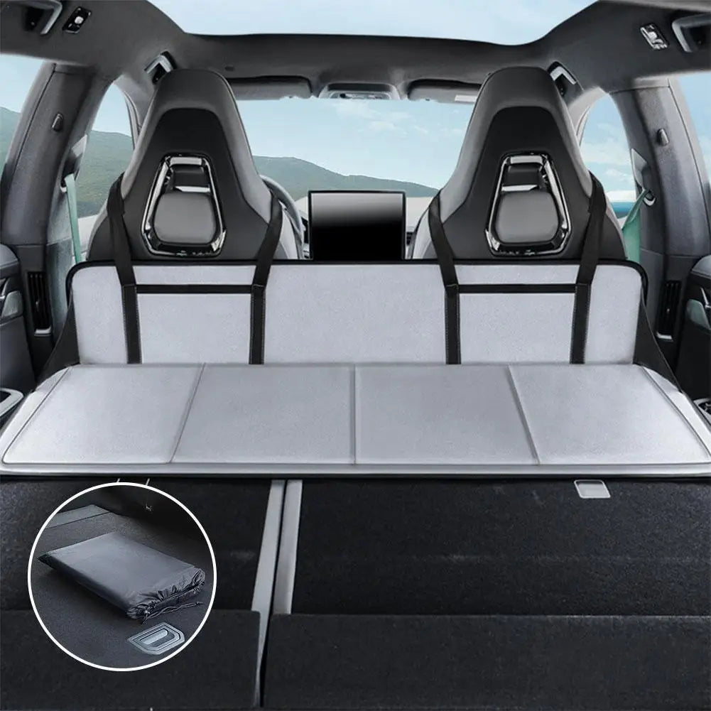 Foldable non-inflatable car mattress for SUVs and trucks with storage bag and side mesh.