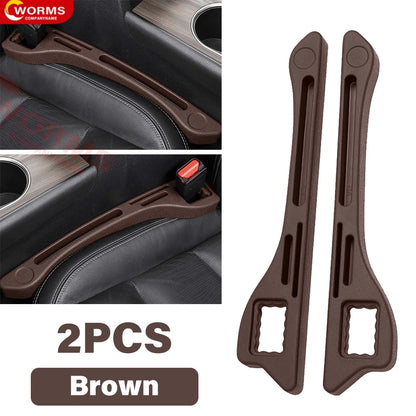 Universal car seat gap filler plug strip made from durable PU material, designed to prevent items from falling into the gap between the seat and console. Features holes for seat belt buckle access. Available in multiple colors.